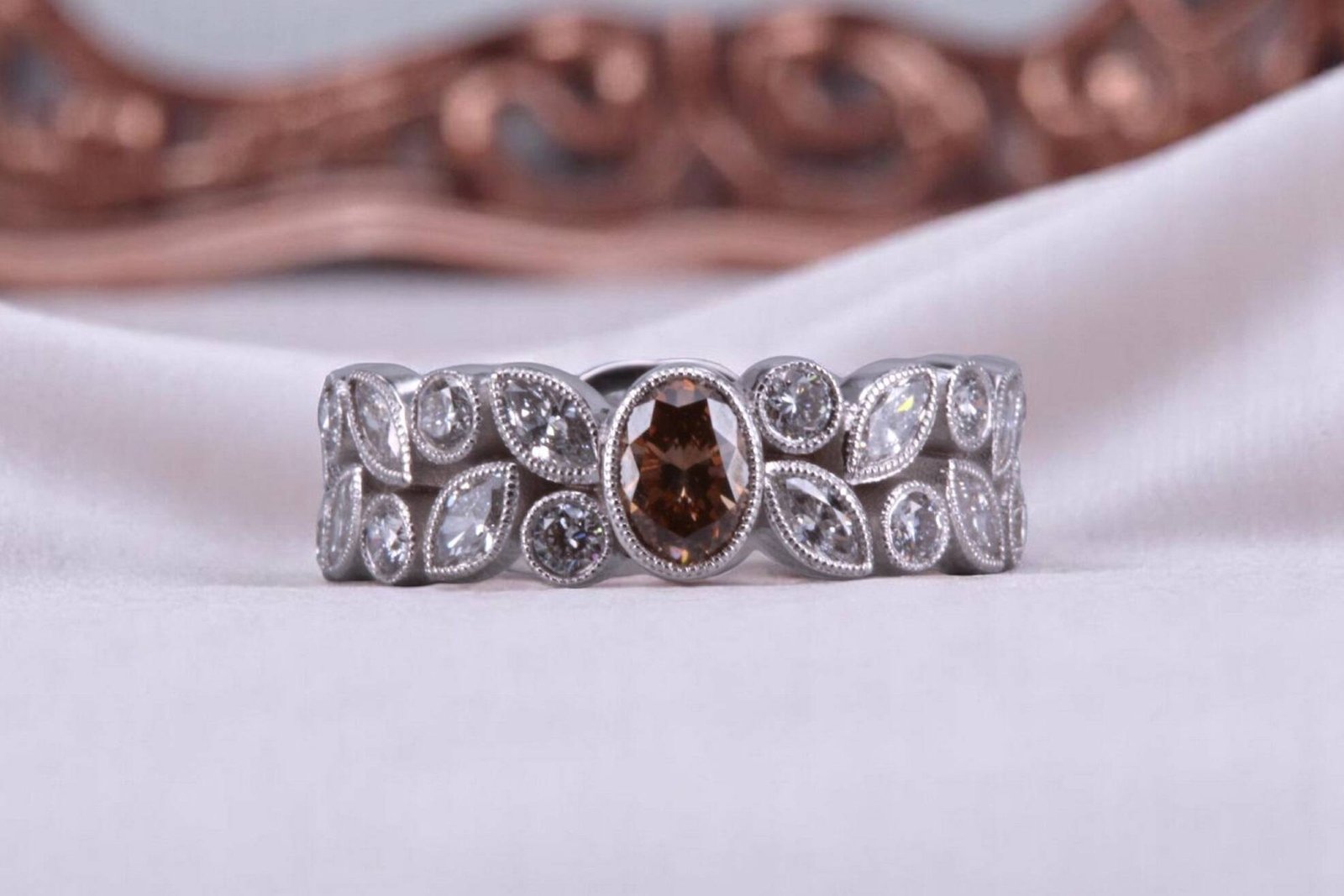 Non-traditional rootbeer diamond floral ring for couples in Hillcrest, San Diego